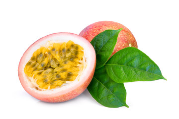 whole and half of passion fruit with green leaves isolated on white background