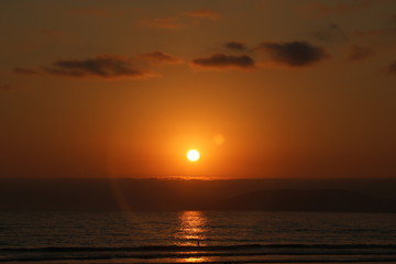Fototapeta na wymiar Sunset and surf