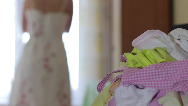 Household chores of a young mother's