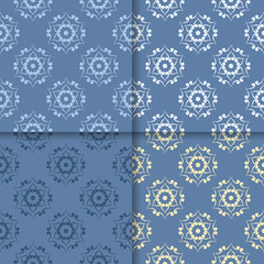 Blue set of floral ornaments. Seamless patterns