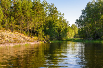 Fototapeta na wymiar Quiet bay in the skerries of Lake Ladoga. Pitkyaranta, Karelia, Russia.