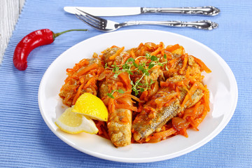 fish braised with carrot, onion, tomato sauce