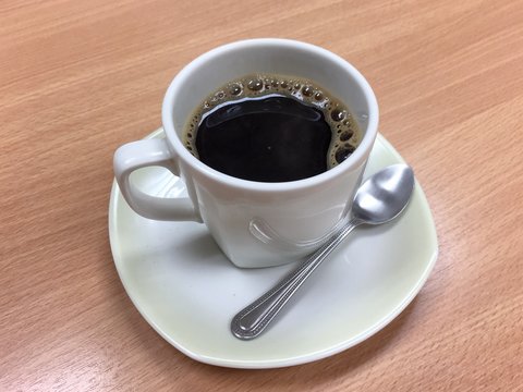 Black coffee cup on the table