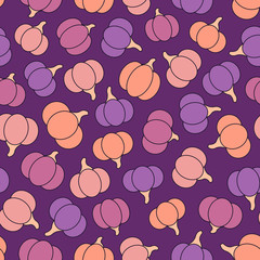 Colorful vector seamless pattern with purple, pink, yellow and orange pumpkins. Halloween creative design.