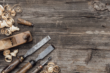 Old carpentry tools on the workbench - obrazy, fototapety, plakaty