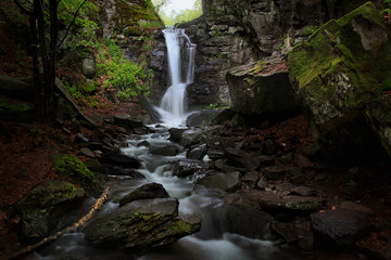 Waterfall Forest Scene with Moss Rocks