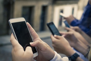 hand group with mobile phones