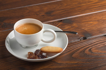 cup of coffee on a wooden table