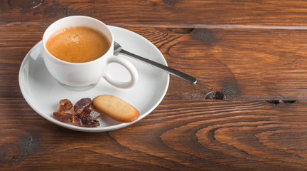 cup of coffee on a wooden table