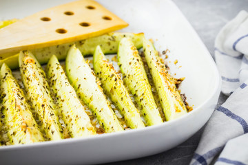 Grilled zucchini wedges. Selective focus, close up.