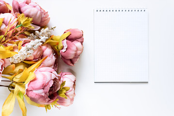 Pink peony with white background. Top view of floral texture and clear scape for text. Closeup flowers postcard for woman day of spring.