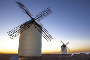 Obraz premium Illuminated traditional windmills at rising