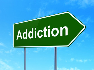 Health concept: Addiction on road sign background