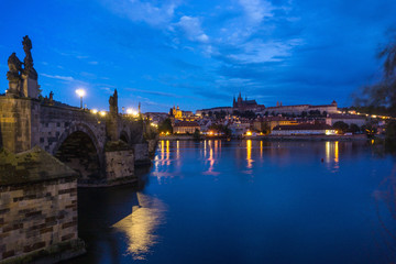 Fototapeta premium Old Town ancient architecture and river pier in Prague, Czech Republic
