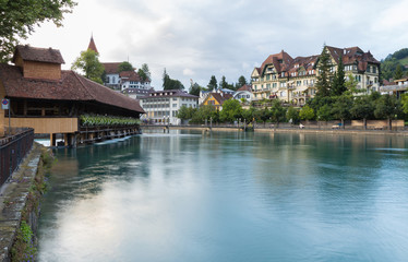 Fototapeta premium River Aare and wooden bridge