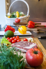 fresh raw meat with vegetables on a wooden Board for cooking