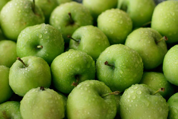 Fresh green apples full frame use as background