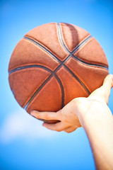 Fototapeta premium man holding a basketball