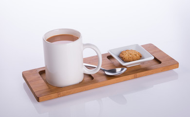 coffee or coffee with cookies on background.