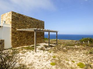 Traditiona brick wall construction near the ocean in Sintra, Portugal