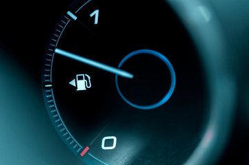 Close-up of the dashboard and fuel gauge in the car