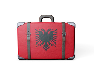 Albania flag on a vintage leather suitcase. 3D Rendering