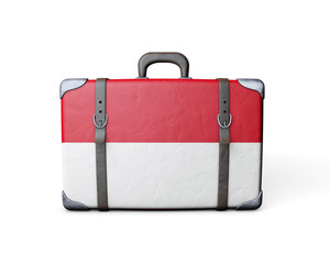 Indonesia flag on a vintage leather suitcase. 3D Rendering