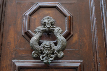 Fototapeta na wymiar Door Knocker in Florence, Italy