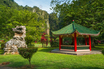 Red chinese pagoda in a park