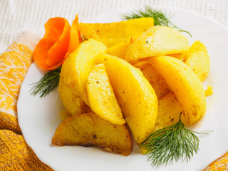 baked potatoes with greens and spices on the plate