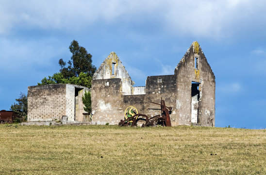 Rural Old  Derelect Farm Building on Dry Winter Landscape