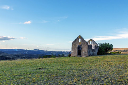Rural Old  Derelect Farm Building on Dry Winter Landscape