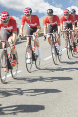 Fototapeta premium Group of cyclist during a race, motion blur
