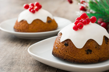 Christmas pudding on wooden table
