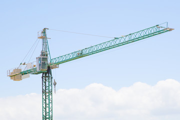 Green tower crane
