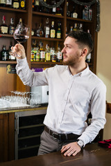 Sommelier tasting the wine