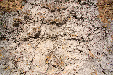 Naklejka premium Texture of an old uneven cement wall