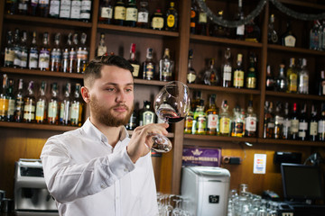 Sommelier tasting the wine