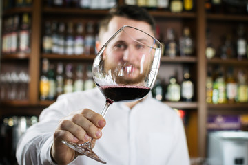 Sommelier tasting the wine