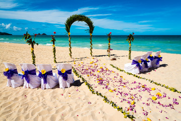 wedding ceremony setup on a Hawaiian beach