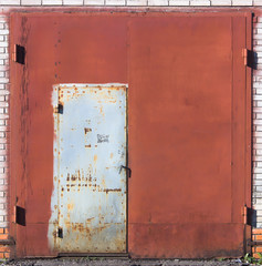 Metal gate with wicket door