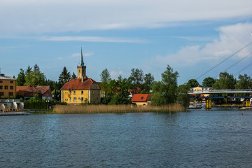 View on the Mikolajskie lake in Mikolajki city, Masuria, Poland
