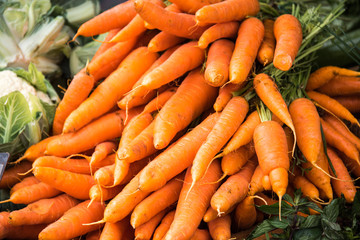 Fresh organic heirloom carrots at farmers market