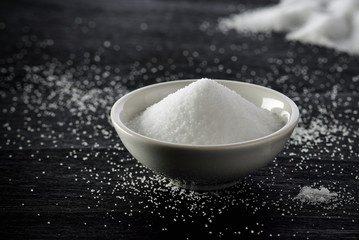 Salt in a bowl on table