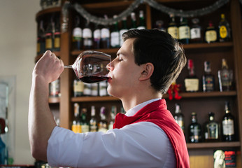 Sommelier tasting the red wine