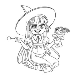 Cute girl in witch costume sitting on the floor and plays with a