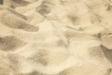 closeup of sand pattern of a beach in the summer