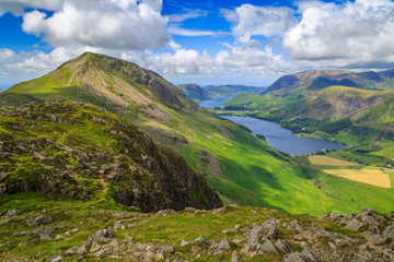 Fototapeta na wymiar Buttermere Valley to the Solway Firth in Scotland, the view from Haystacks in The Lake District, Cumbria, England