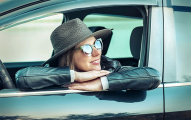 Woman at spreeng time. Yoyng happines female in hat and sunglass
