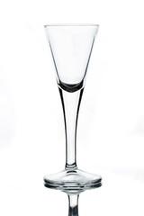 empty spirit or shot glass for alcohol on white background